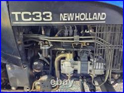 New Holland TC33 Tractor With Woods RD7200 Mower Attachment New Holland TC33 Tractor With Woods RD7200 Mower Attachment