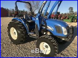 New Holland TC55DA Farm Tractor. 4x4. Loader. Shuttle. 1500 Hours. Mint Conditio