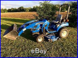 New Holland TZ24D 4x4 Diesel Tractor 10L Loader MOWER extra AG tires 4WD 543 HRS