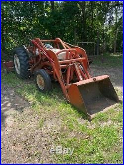 Tractor with loader and trailer