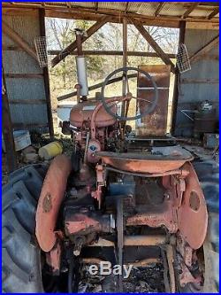 Two vintage Farmall Tractors
