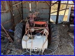 Two vintage Farmall Tractors