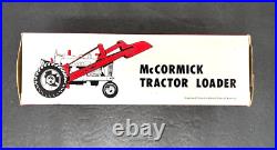 Vintage McCormick Tractor Loader with Original Box 9 3/4 x 3 x 3 1/2
