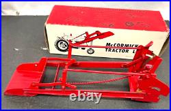 Vintage McCormick Tractor Loader with Original Box 9 3/4 x 3 x 3 1/2